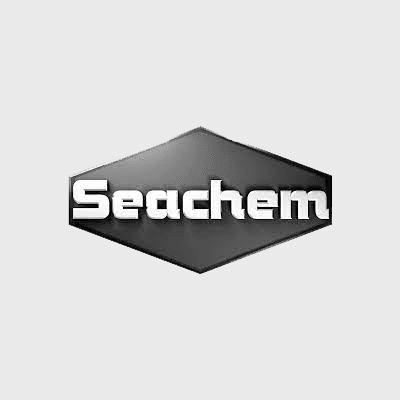 A black, hexagonal-shaped Seachem logo with bold, white 3D letters spelling Seachem on a gray background.